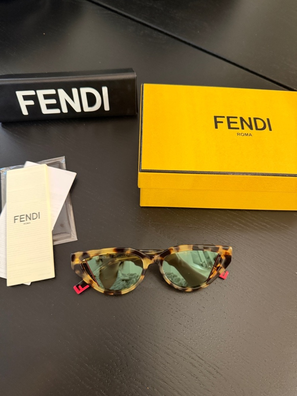 Fendi Tortoiseshell Cat-Eye Sunglasses with Green Lenses and Pink Temple Accents